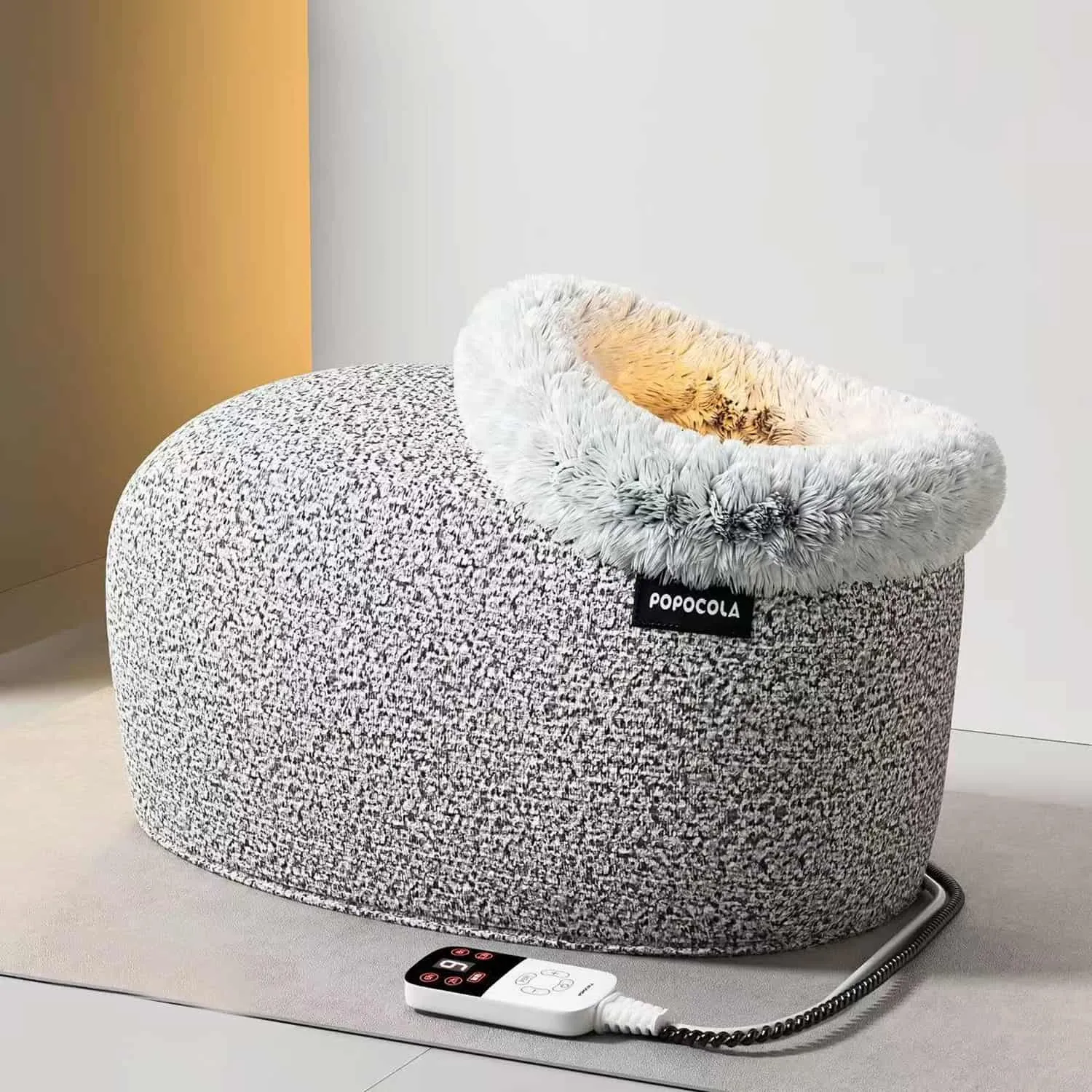 Electric heated enclosed cat bed with textured boucle exterior shell, faux fur collar rim around the entry opening, cotton lining interior, 9-level temperature control, timer, digital controller, dome silhouette for living room placement