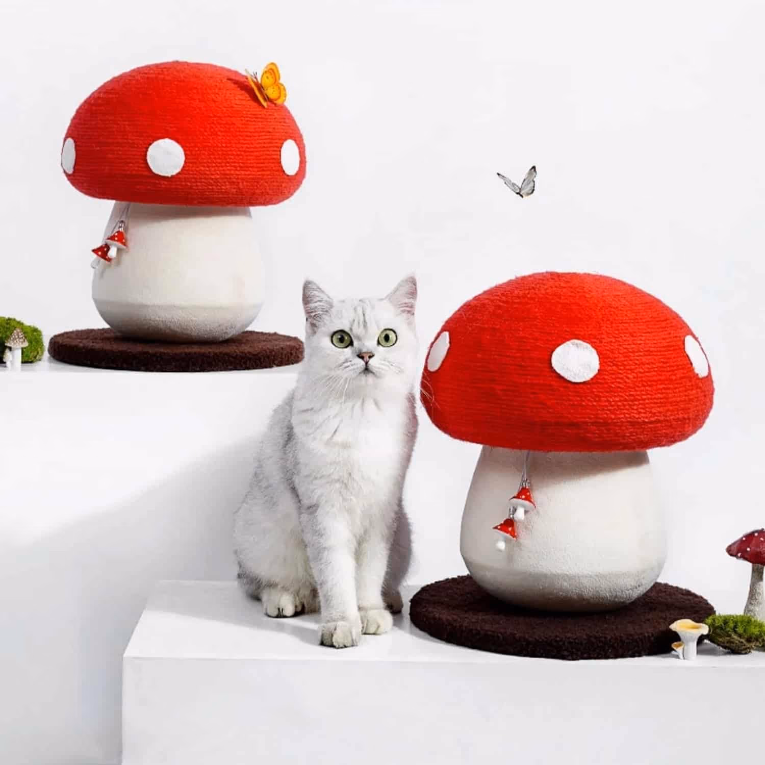 Mushroom-shaped cat scratching post with red sisal rope cap, white fabric stem, and brown plush base pad