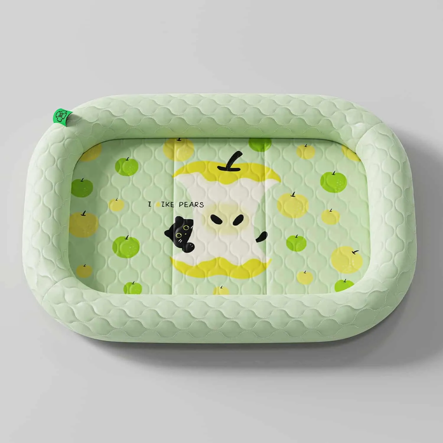 Green ice silk cooling dog bed with raised padded walls and pear print design, shown with a small white dog resting its head on the edge