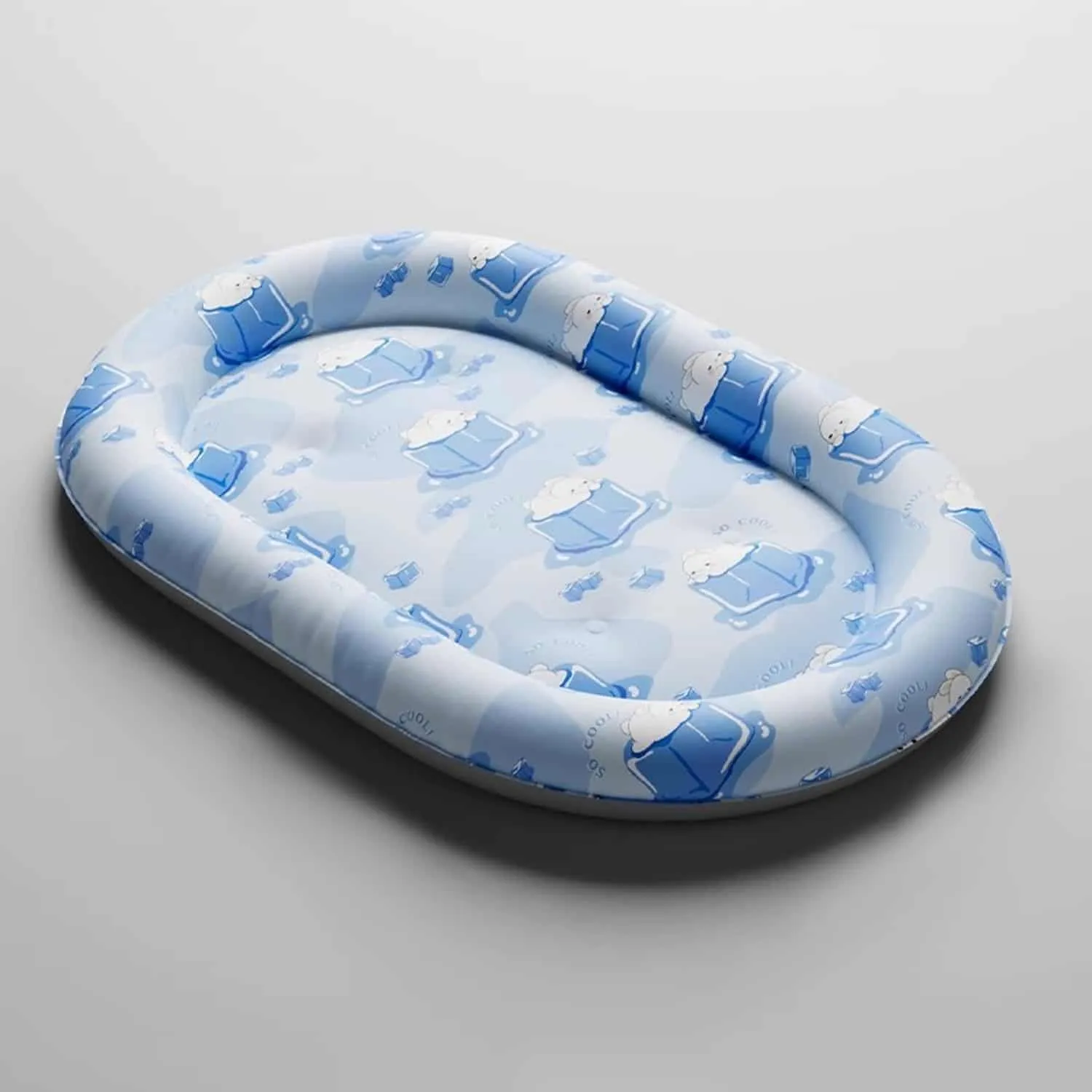 Blue and white pet cooling gel bed with polar bear print, raised bolster walls, and gel core layer visible in cross section