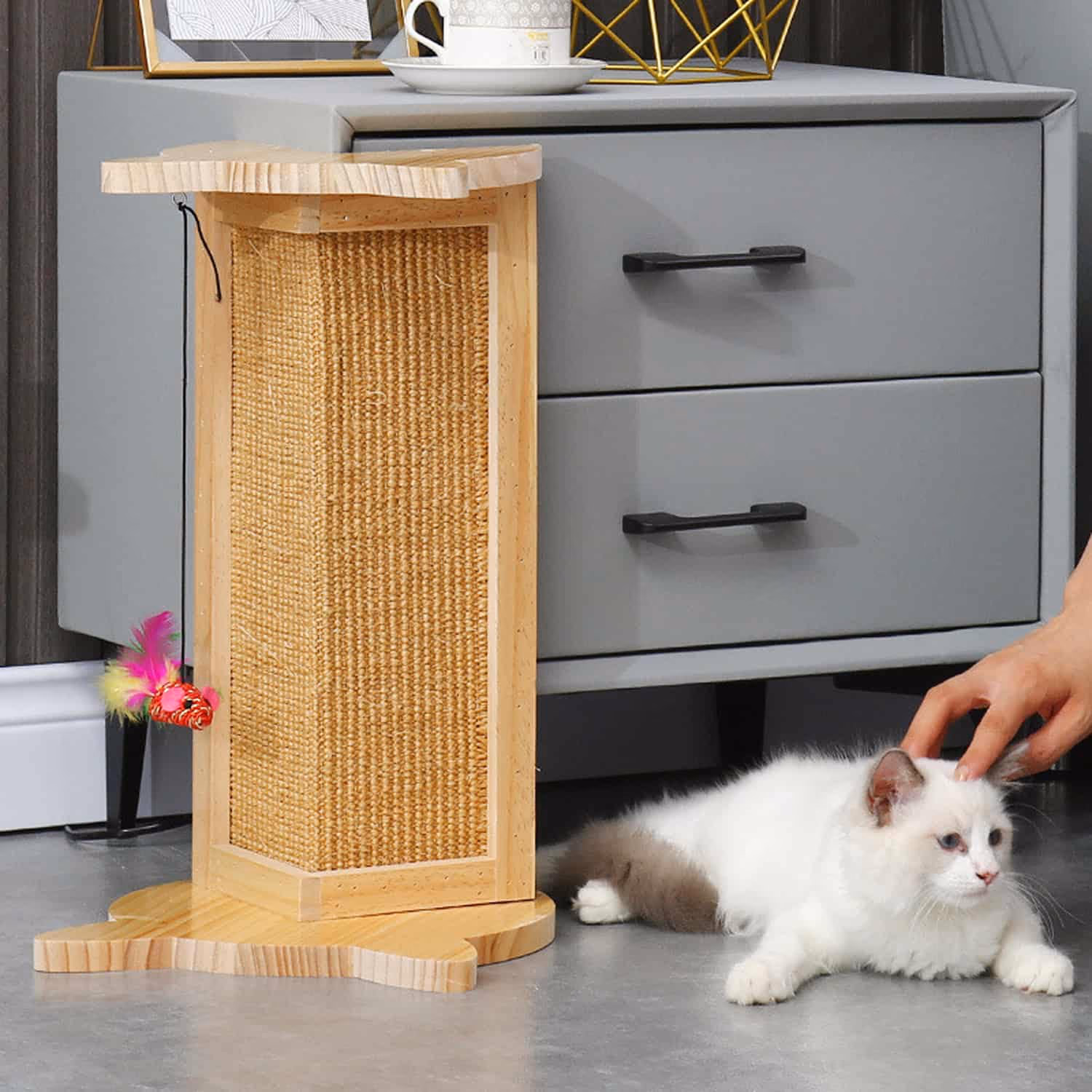 Corner-mounted cat scratcher with natural sisal wrap and solid wood frame protecting two walls