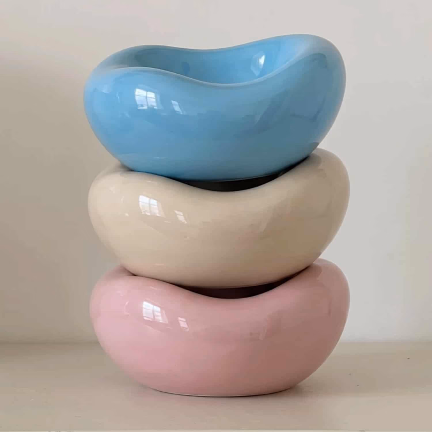 Ocute cloud shaped ceramic cat bowl in foggy blue and berry pink with wide shallow basin